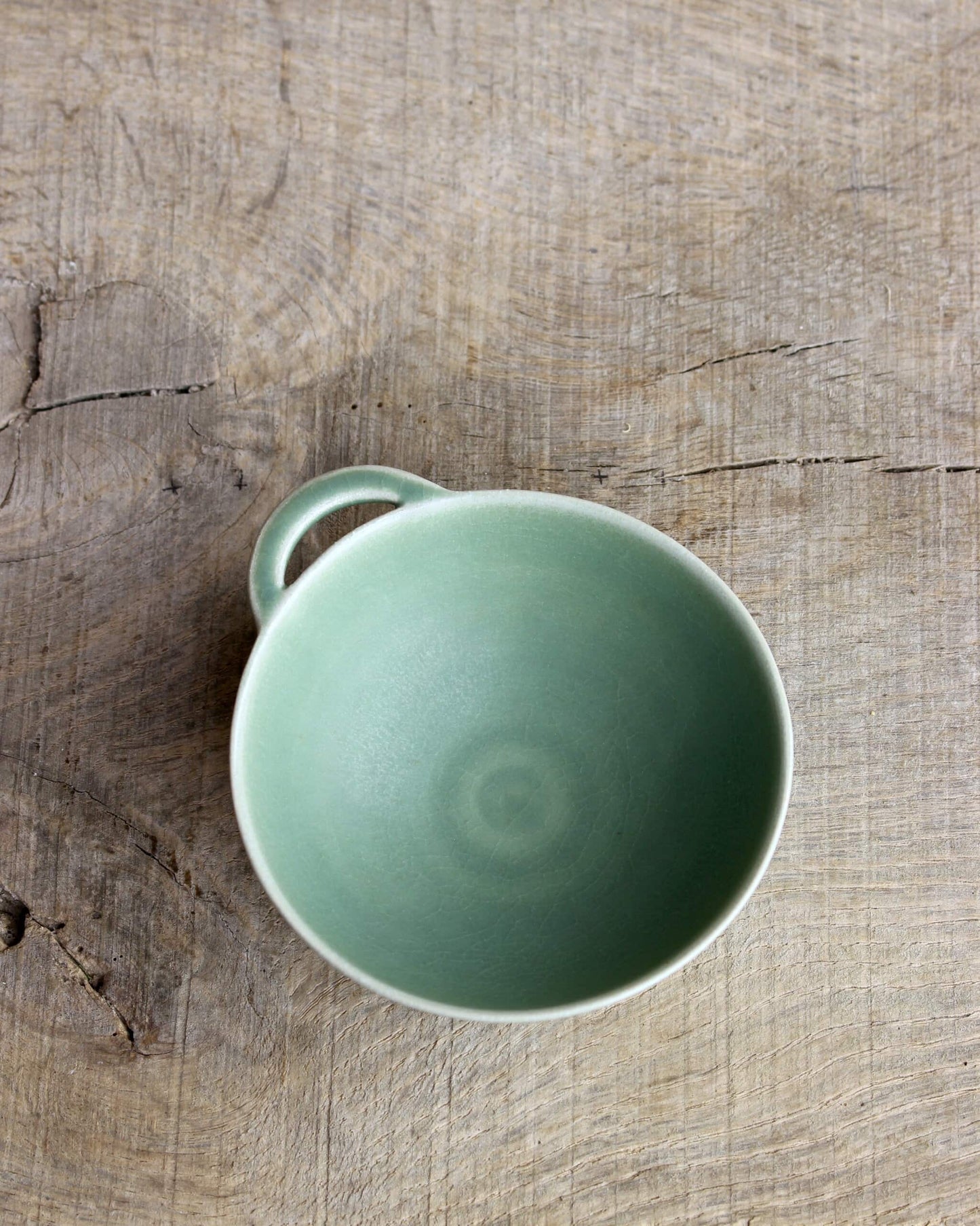 Small bowl with openwork tab